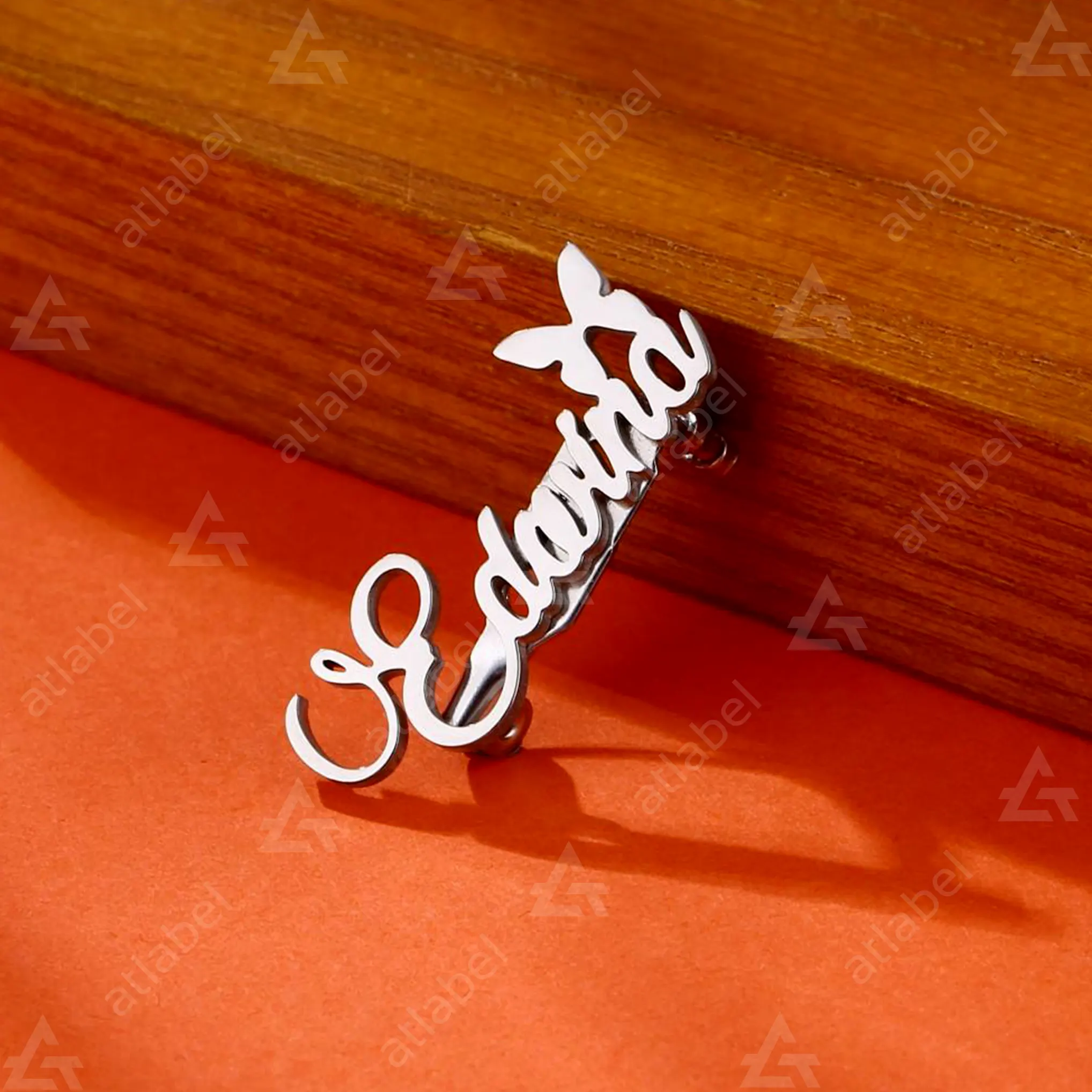 Tem nhãn mác quần áo thời trang bằng kim loại