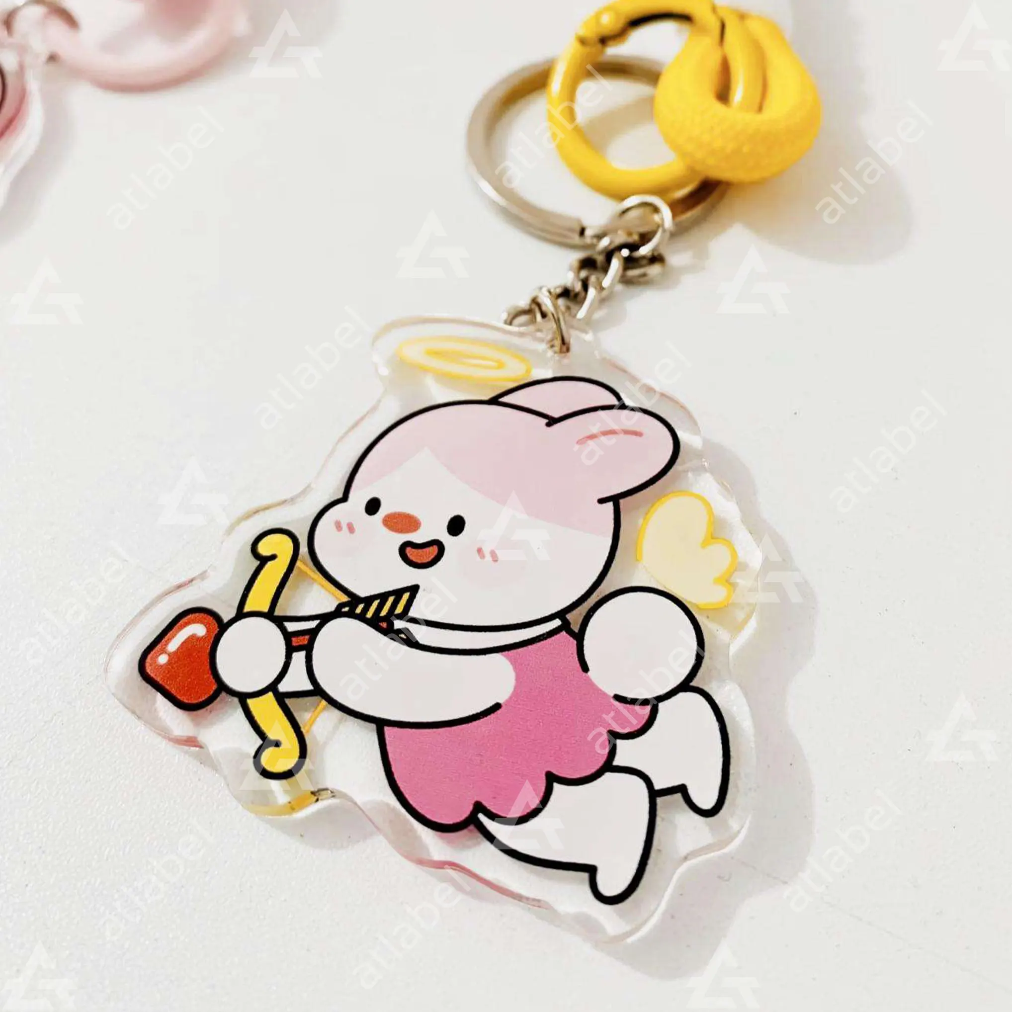 Móc khóa mica in theo yêu cầu - Nhận thiết kế miễn phí, giao nhanh 5/2026 4 Móc khóa mica in hình ảnh cực dễ thương